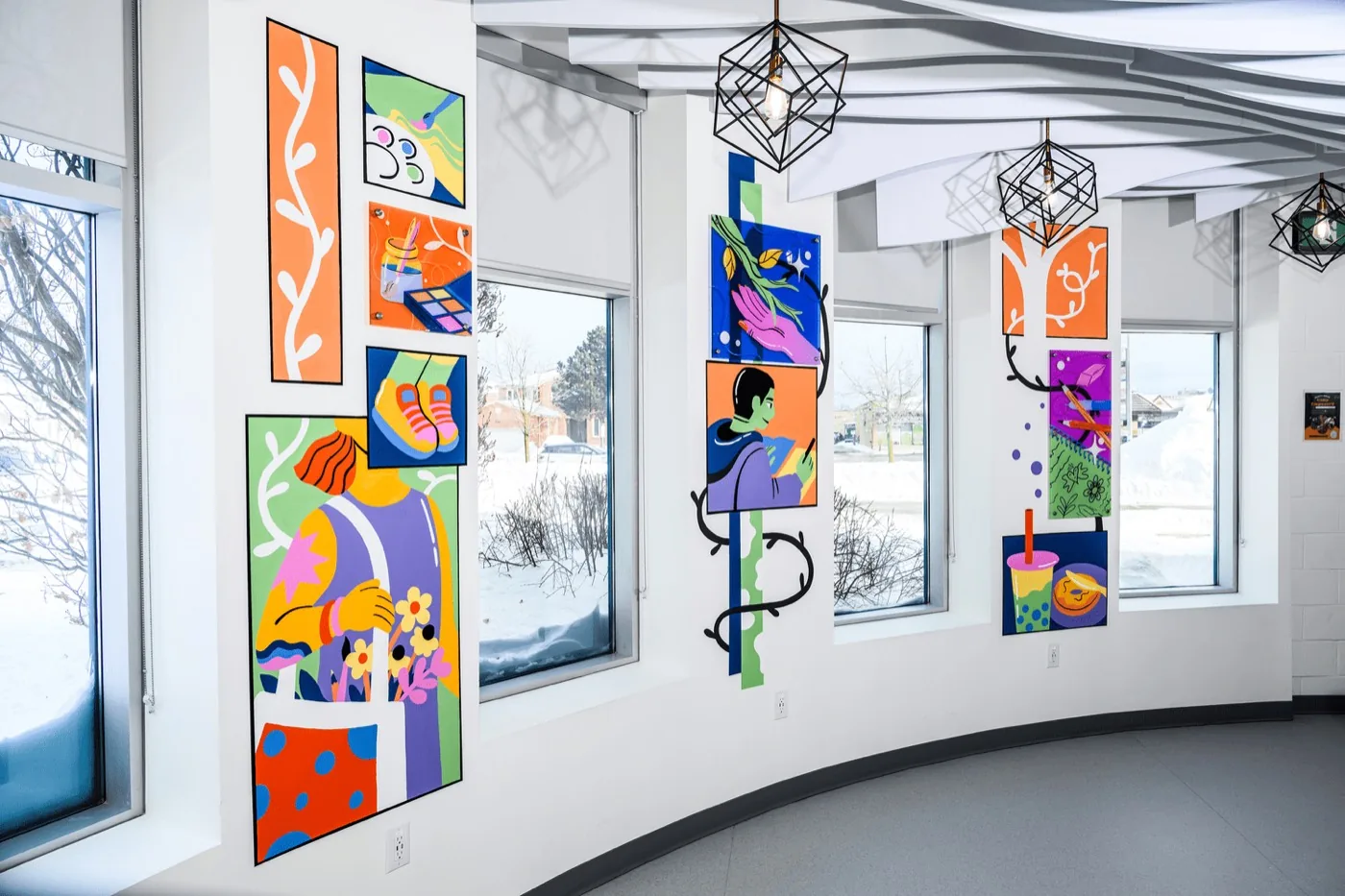 Mural detail with bold colour and playful characters